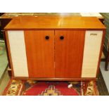 A Murphy Stereophonic teak cased radiogram, circa 1970's, raised on tapering legs, 76cm high, 84cm