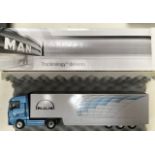 MAN Trucknology TGA 18.530 articulated truck by Conrad, model ZY CO661-5800, boxed, along with