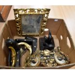 A collection of assorted brassware, including Art Nouveau door plates, large baskets, clock,