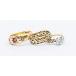 A George V 18ct gold, ruby and diamond three-stone ring, makers mark LS, size Q1/2, gross weight