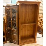 An oak glazed free standing corner cupboard, together with a pine shelving unit (2)