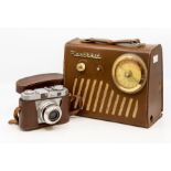 A vintage Heathkit leather cased radio (strap broken) and a vintage Iloca camera, leather case (2)