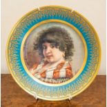A Vienna porcelain cabinet plate by F.Eistner, circa 1890, finely painted with a gypsy girl,