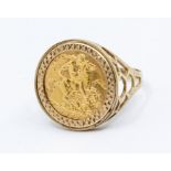 A half sovereign dated 1982 in 9ct gold mount, size W, total gross weight approx 7gms  Condition