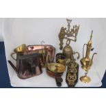 Two boxes of assorted brass ware, including a pair of Victorian candlesticks, horse brasses,
