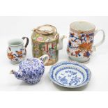 A collection of 18th Century Chinese items including porcelain tankards, dish, and white teapot,