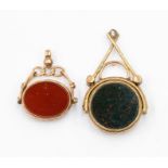 Two hardstone seal swivel fobs in 9ct gold, both set with carnelian and bloodstone, total gross
