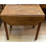 An early 19th Century mahogany Pembroke table, raised on square legs