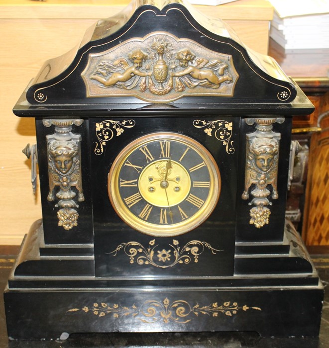A 19th Century eight day slate cased mantel clock, probably French, 51cm high, 49cm wide, 17cm deep