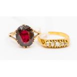 A 9ct gold and oval cut garnet ring, size J, total gross weight approx 2.9gms, together with an
