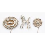 A group of silver jewellery including: Victorian silver shaped oval brooch, gilt metal clasp,