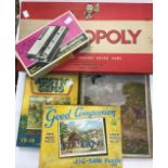 A 1970's boxed stylophone, jigsaws and Monopoly board game