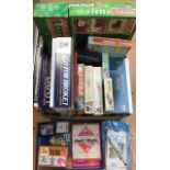 A collection of assorted 20th Century and later games, including Topple Blocks, Solitaire board,