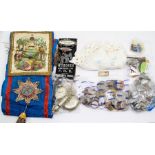 A collection of military items, including The Order of Druids Sash, various medals, two pocket