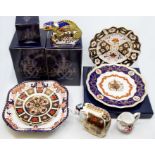 A group of Royal Crown Derby Imari plates, two commemorative and square dish, two paperweights,