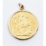 A sovereign dated 1918, in 9ct mount, total gross weight 9gms approx 9.2gms