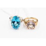 A 9k Swiss blue topaz white gold dress ring, a 9ct Rose De France amethyst gold ring, each of ring