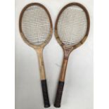 Two vintage tennis rackets, one Slazenger and one Dunlop Maxply with initials A.J.M., possibly being