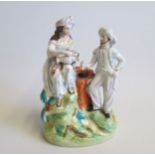 A Staffordshire Thomas Parr Figure of Rebekah and Abrahams Servant by a well Date  circa  1850-60