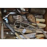 A collection of silver plate and EPNS, bone handled flatware including berry spoon servers, toast