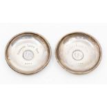 A pair of late Victorian silver dishes inset with 1 Shilling South African coin each dated 1896, the