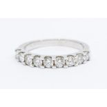 An 18k white gold and diamond nine-stone ring, total diamond weight approx 1ct, ring size O1/2,