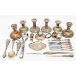 A quantity silver to include various candlesticks and flatware, various dates and makers (Q) AF