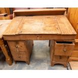 A 19th Century pine kneehole desk, 96cm high, 102cm wide, 66cm deep