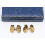 A pair of 9ct gold cufflinks with floral engraved decoration and initials, 8.91grams approx,