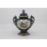 A Royal Crown Derby twin-handled pedestal vase and cover, dated 1896, finely painted with Chelsea