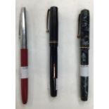 Three fountain pens, two with 14ct gold nibs