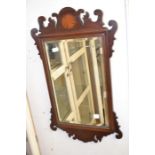 Early 19th Century mahogany fret mirror with batwing inlay and Victorian bevelled glass