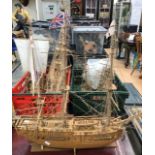 Five hand made wooden display boats of various ships