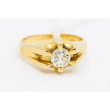 A diamond and 18ct gold ring, the brilliant cut diamond approx. 0.70ct, claw set within a fancy