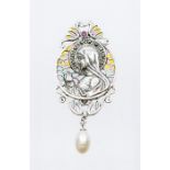 A silver plique a-jour enamel brooch/pendant in the form of the Virgin Mary, the surround set with a