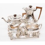 A four piece silver plated tea set to include a teapot, hot water pot, sugar and milk jug, all