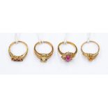 Four contemporary rings including 9ct ruby and white sapphire gold ring, 9ct gold citrine ring, a