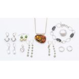 A collection of jewellery to include a silver and amber pendant with chain, a silver and Boodles