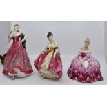 Three Royal Doulton figures to include Southern Belle HN2229, Victoria HN2471, Carmen HN3993,