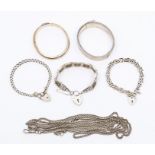 A silver gate-link bracelet with padlock clasp; two further silver bracelets with padlock clasps;