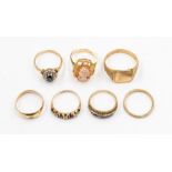 A collection of 9ct gold rings, to include a signet ring, cameo set ring, three set with sapphires