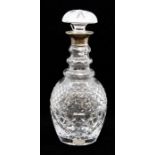 An Elizabeth II silver mounted hob nail cut baluster decanter and stopper, the silver collar
