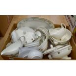 Four boxes of 20th Century china tea wares including Wedgwood and modern Suzie Cooper