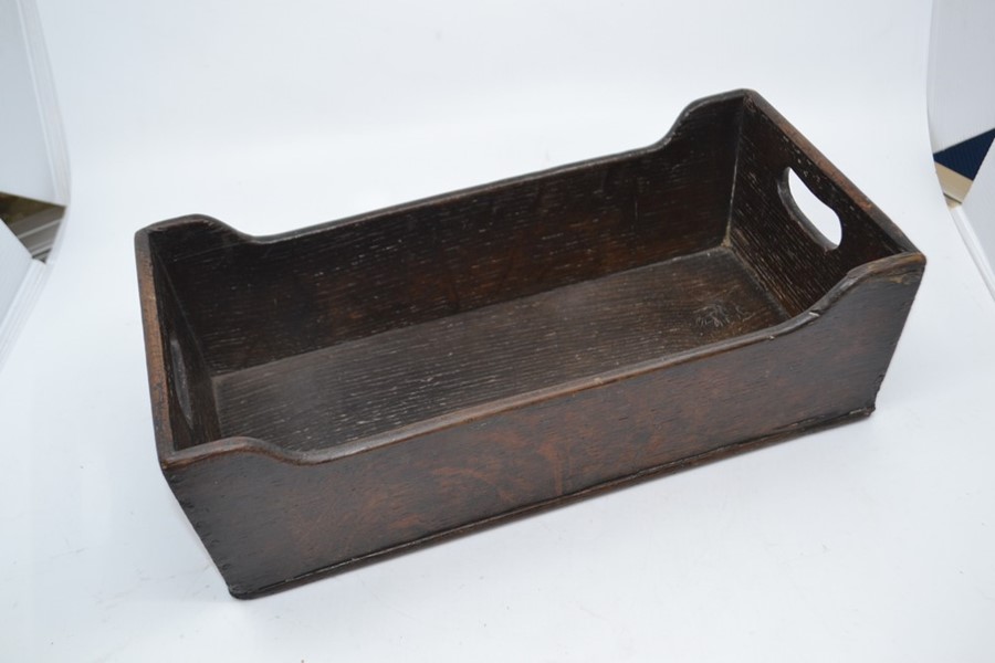 An Edwardian oak letter tray