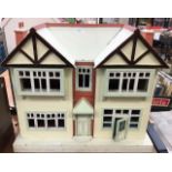 A 1960's children's homemade dolls house, plus collection of period furniture, all hand created