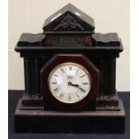 A large French black slate 19th Century mantel clock with black and gilt face classical figures