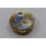 An Elliott Hall Enamels round box, hand painted with birds of prey by Terry Halloran, 23 of 25,