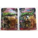 Two Teenage Mutant Ninja Turtles, Leonardo and Donatello, made by Playmates, 1988. Both carded,