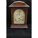 An Edwardian, Westminster chime mantle clock, silvered dial, roman numerals, within mahogany