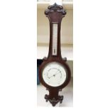 A mid 19th Century mahogany banjo barometer and thermometer, scrolled top and bottom